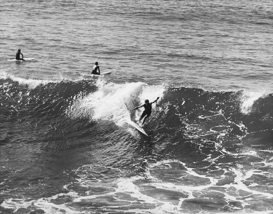 Riding A Wave Photograph by American Stock Archive