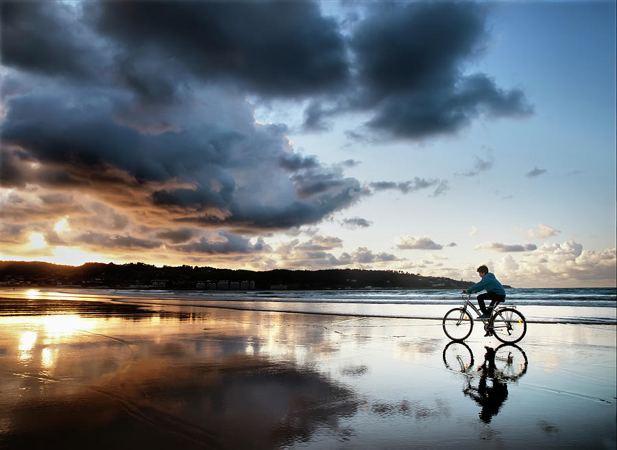 Riding Bike At Beach Photograph by Santiago Bañón