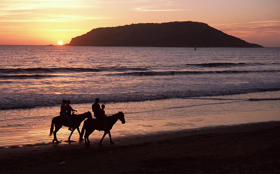 Riding Horses On The Beach, Mexico Photograph by James Gritz