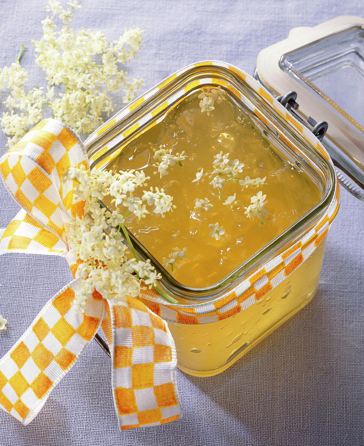 Riesling And Elderflower Jelly In A Flip-top Jar Photograph by Teubner Foodfoto