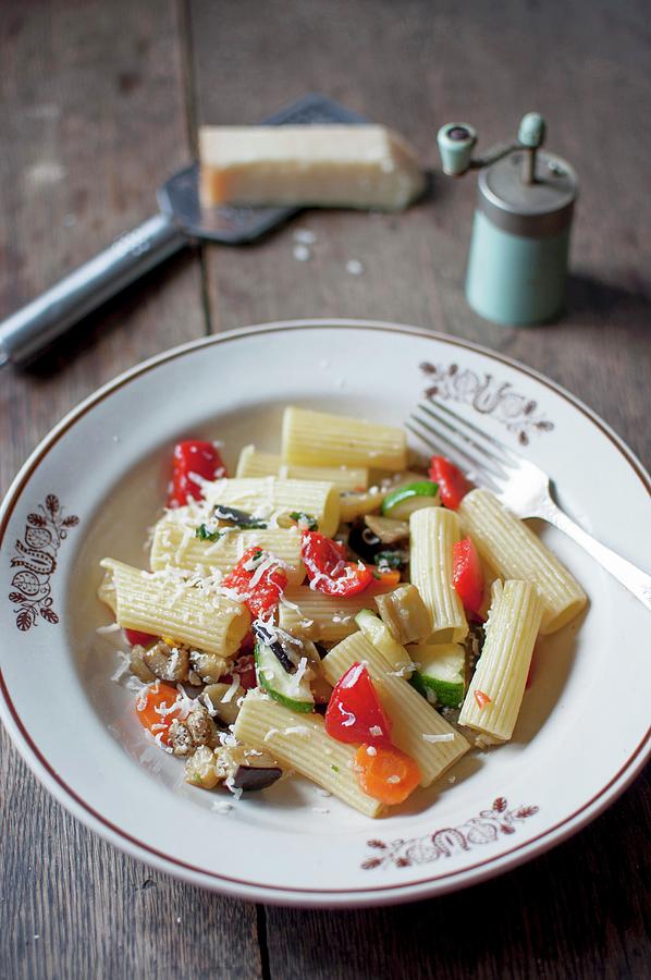 Rigatoni Ortolana. Pasta With Vegetables zucchini, Eggplant, Red Pepper, Carrot, Tomatoes, Garlic And Onion. Served With Grated Parmesan Cheese And Freshly Ground Black Pepper Photograph by Kachel Katarzyna