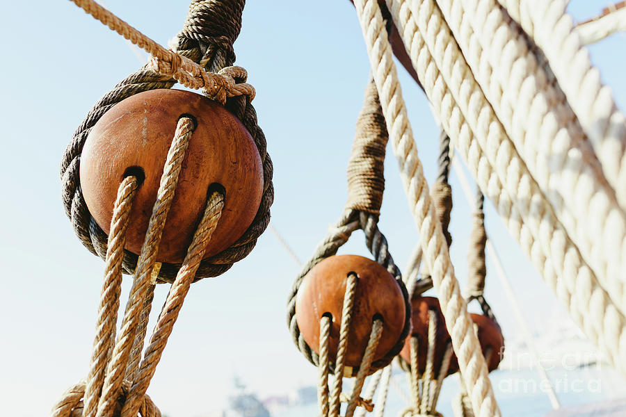 Rigging and ropes on an old sailing ship to sail in summer. Photograph by Joaquin Corbalan