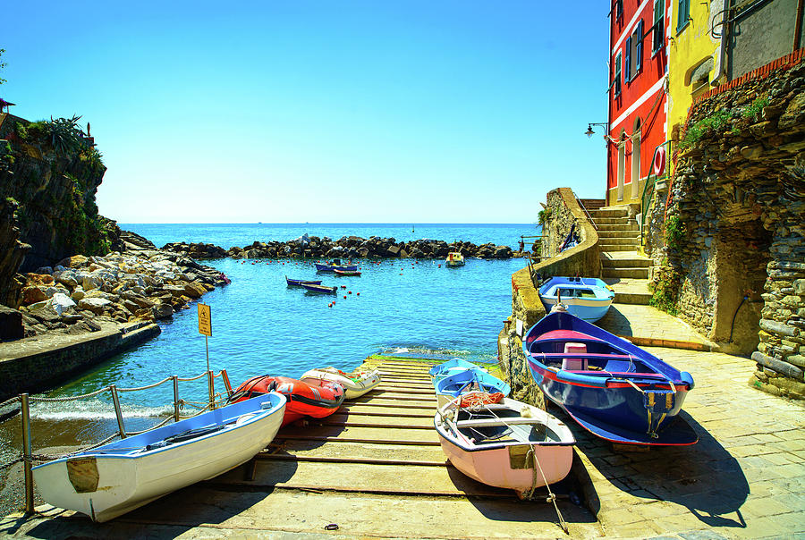 Riomaggiore village street, boats and sea. Cinque Terre, Ligury, Photograph by Stefano Orazzini