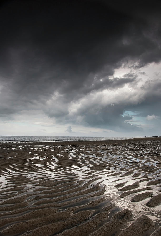 Rippled Sand Under A Dark Cloud At The Photograph by John Short / Design Pics