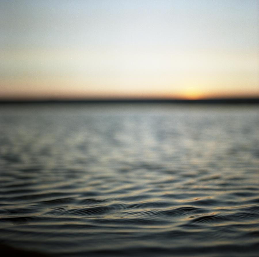 Ripples On Water At Sunset Photograph by Elizabeth Moehlmann