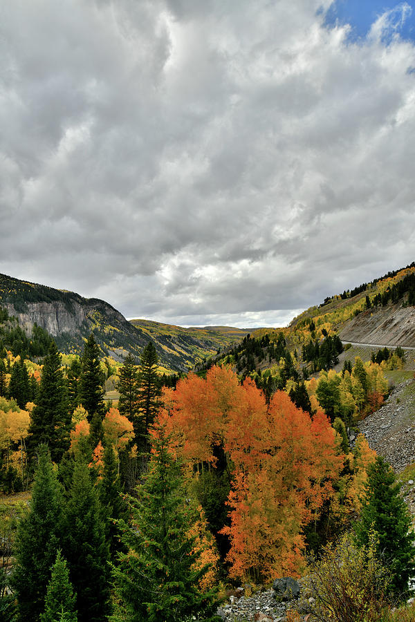 Rising Clouds over Fall Colors near Ilium CO Photograph by Ray Mathis