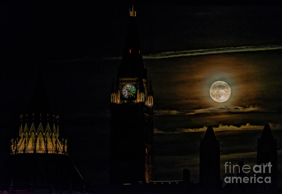 Rising Full Moon Over Parliament Photograph