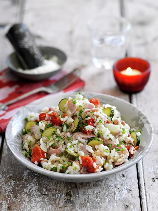 Risotto With Cherry Tomatoes, Courgettes And Bacon Photograph by Gareth Morgans