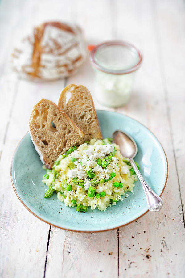 Risotto With Homemade Goats Cream Cheese And Sliced Bread Photograph by Jan Wischnewski