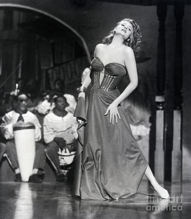 Rita Hayworth Barefeet As She Sings Photograph by Bettmann