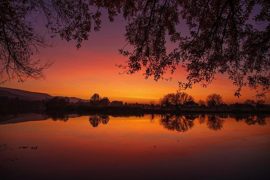 River sunset Photograph by Lynn Hopwood