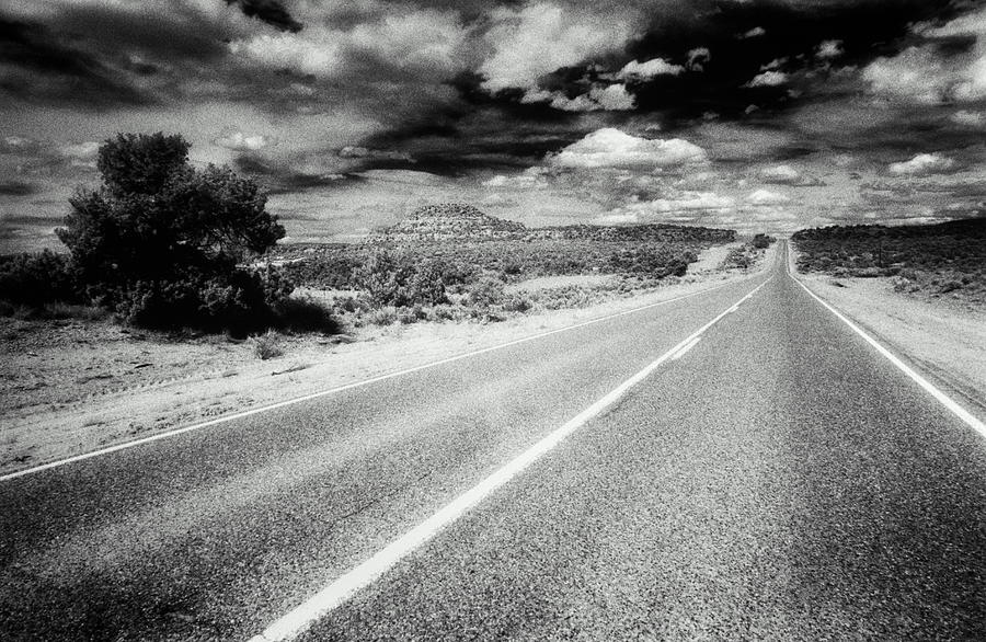 Road Running Through Desert, Hills And Photograph by Dennis Oclair Road Running Through Desert, Hills And Photograph by Dennis Oclair