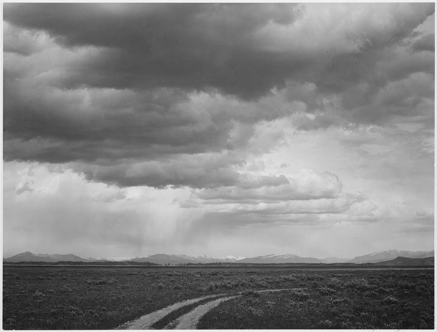 Roadway low horizon mountains clouded sky Near (Grand) Teton National Park 1933 - 1942 Painting by Ansel Adams