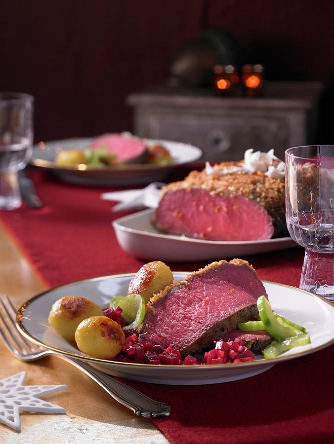 Roast Beef With Beetroot Relish, Roast Potatoes And Cucumber For Christmas Photograph by Jan-peter Westermann