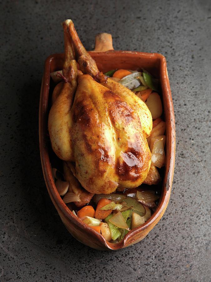 Roast Chicken In A Terracotta Pot Photograph by Joerg Lehmann