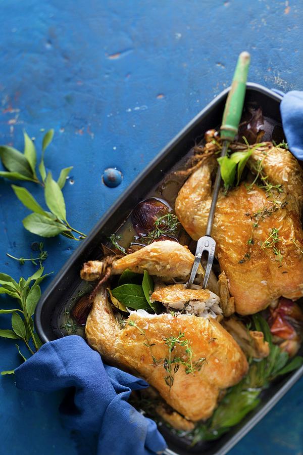 Roast Chicken With Bay Leaves And Garlic Photograph by Great Stock!