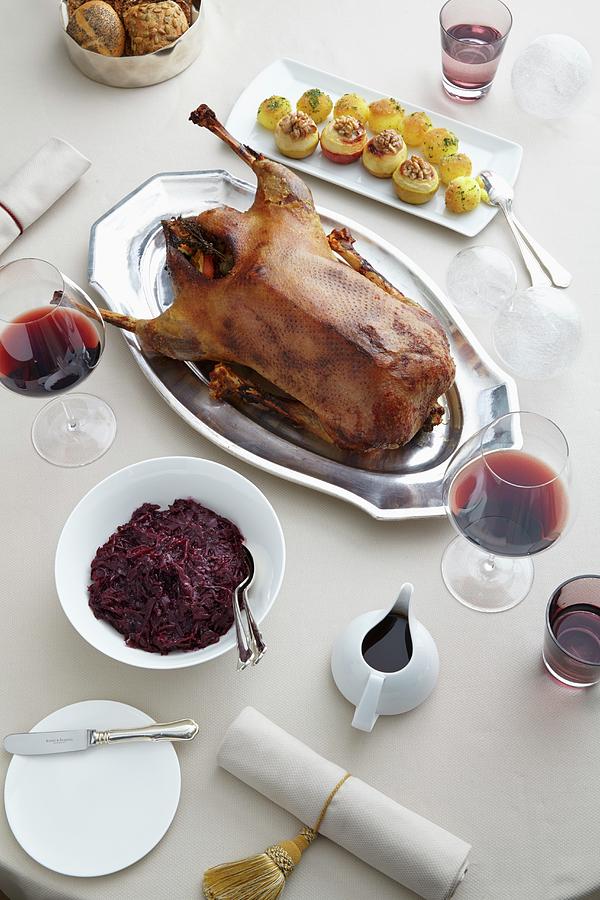 Roast Christmas Goose With Red Cabbage, Dumplings, Gravy And Red Wine ...