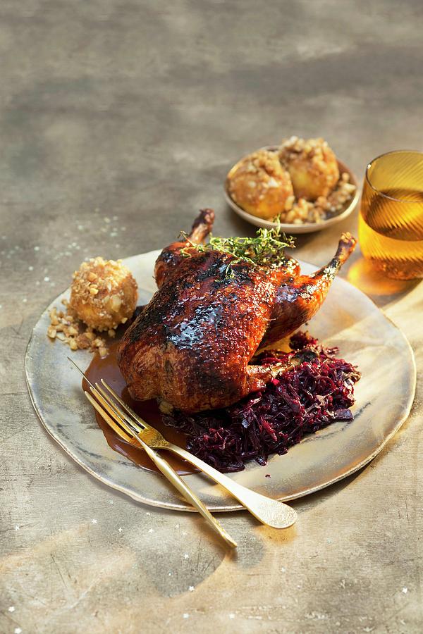 Roast Duck With Red Cabbage And Macadamia Nut Dumplings Photograph by Jalag / Joerg Lehmann