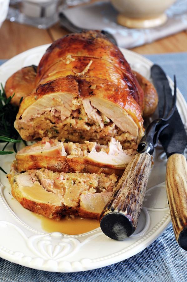 Roast Guinea Fowl Breast Stuffed With Sausage Meat And Chestnuts Photograph by Mario Matassa