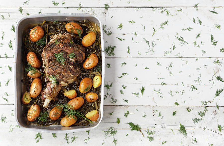 Roast Leg Of Lamb With Fennel And Potatoes Photograph by Adolforuizmaeso