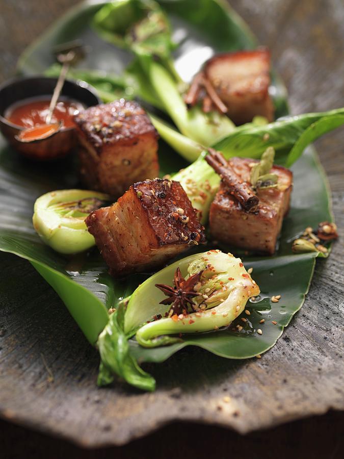 Roast Pork Saigon With Bok Choy And Banana Leaves Photograph by Eising Studio - Food Photo & Video