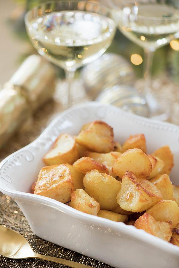 Roast Potatoes a Side Dish For Christmas Photograph by Winfried Heinze