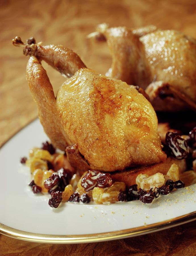 Roast Quail With Grapes And Raisins Photograph by Asset