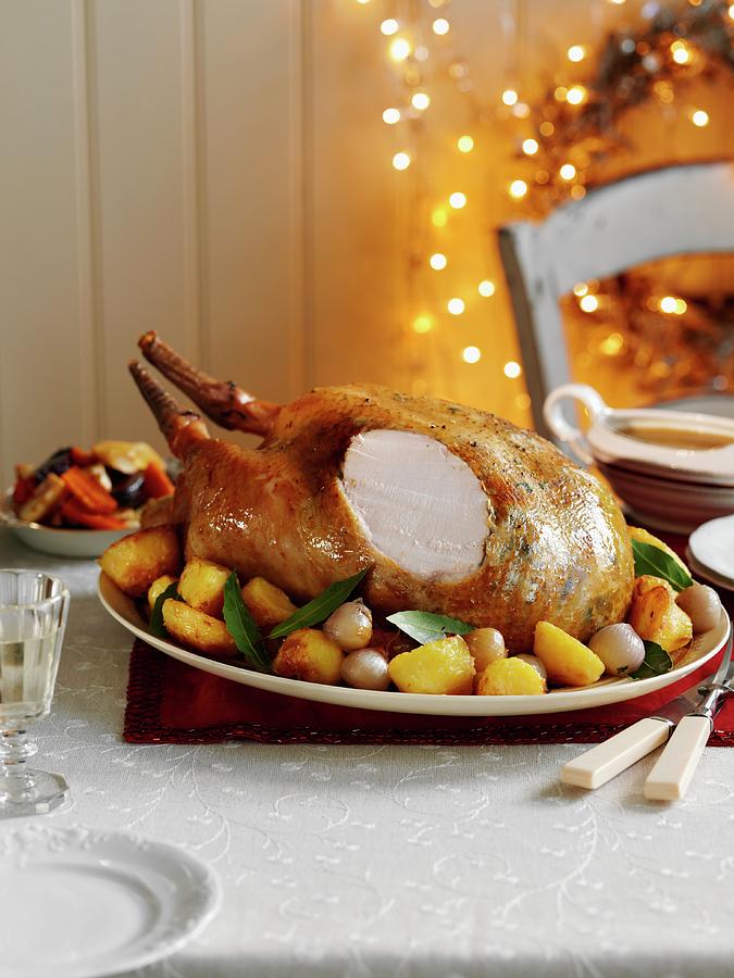 Roast Turkey For Christmas Dinner, Partly Sliced Photograph by Gareth Morgans