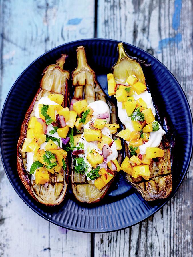 Roasted Aubergines With Greek Yoghurt And Mango Salsa, Red Onions And Coriander Photograph by Amiel