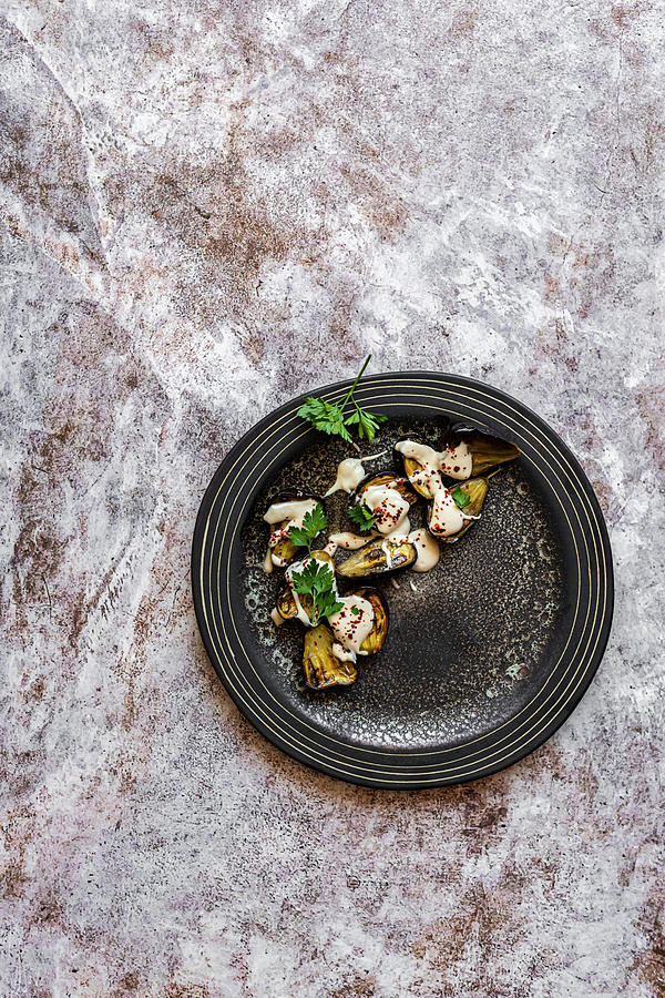 Roasted Baby Aubergine With Aleppo Pepper And Yoghurt Dressing Photograph by Hein Van Tonder