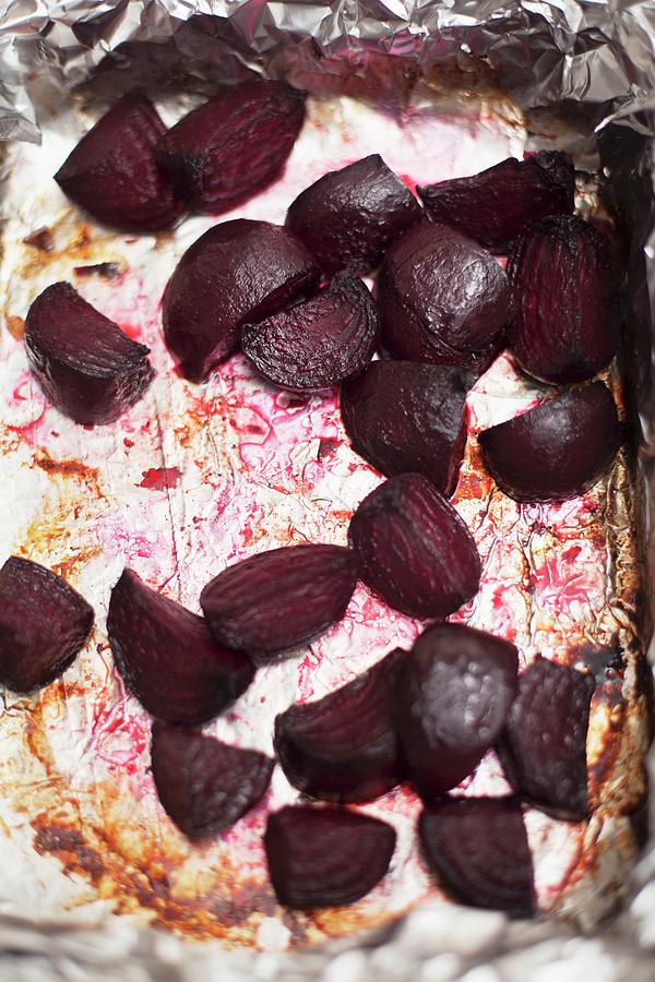 Roasted Beetroot On The Baking Tray With Aluminium Foil Photograph by Lisa Barber