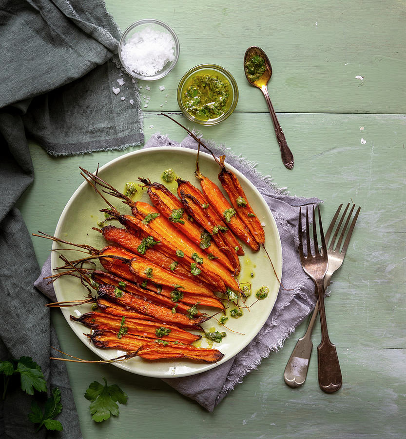 Roasted Carrots With Herb Caper Garlic Pesto And Sea Salt Photograph by Cath Lowe