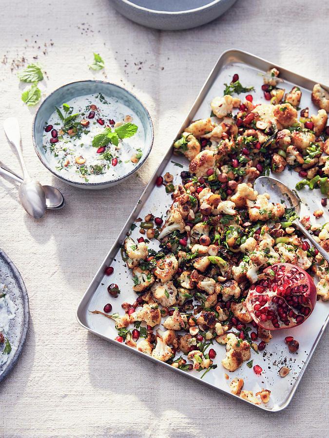 Roasted Cauliflower With Pomegranate Seeds And Mint Photograph by Thorsten Kleine Holthaus