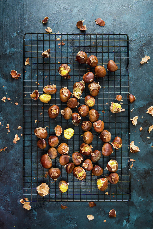 Roasted Chestnuts On A Cooling Rack seen From Above Photograph by Aniko Takacs