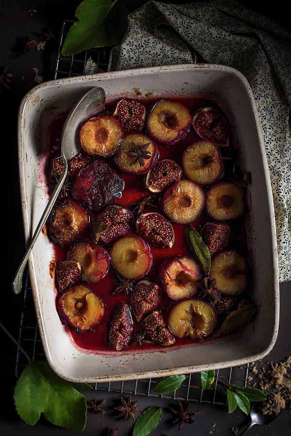 Roasted Plums And Figs With Brown Sugar And Spices Photograph by Magdalena Hendey