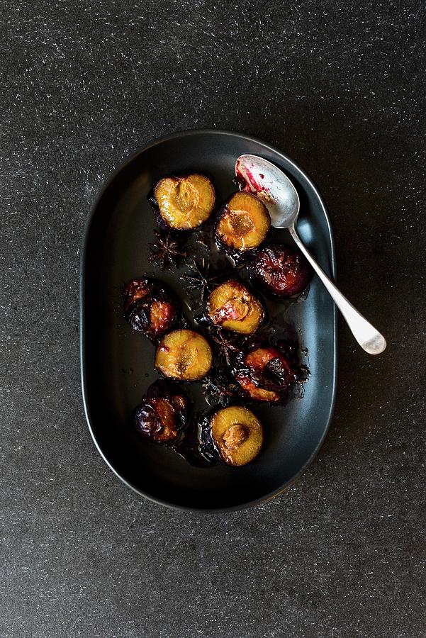 Roasted Plums With Star Anise Photograph by Hein Van Tonder