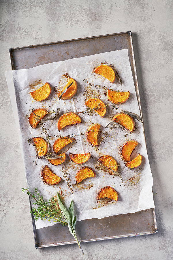 Roasted Pumpkin With Sage And Thyme, Light Background Photograph by ...