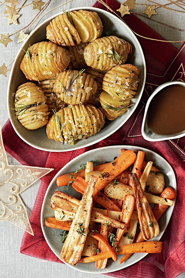Roasted Root Vegetables And Hasselback Potatoes For Christmas Photograph by Jonathan Short