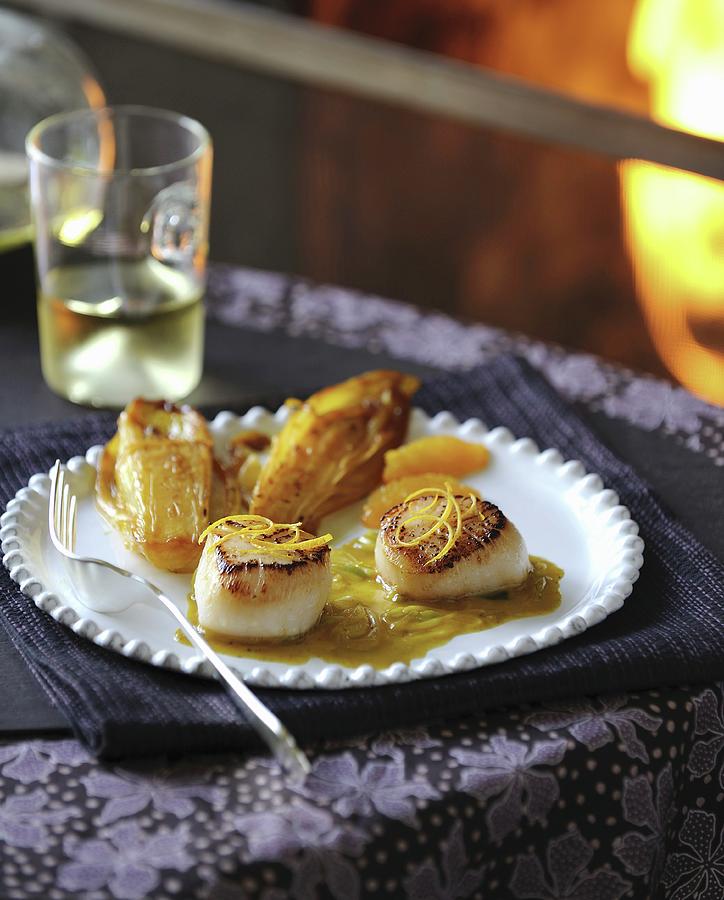 Roasted Scallops And Braised Chicory With Orange Photograph by Carnet