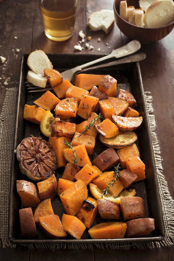 Roasted Sweet Potatoes With Garlic, Lemon And Herbs Photograph by Maricruz Avalos Flores
