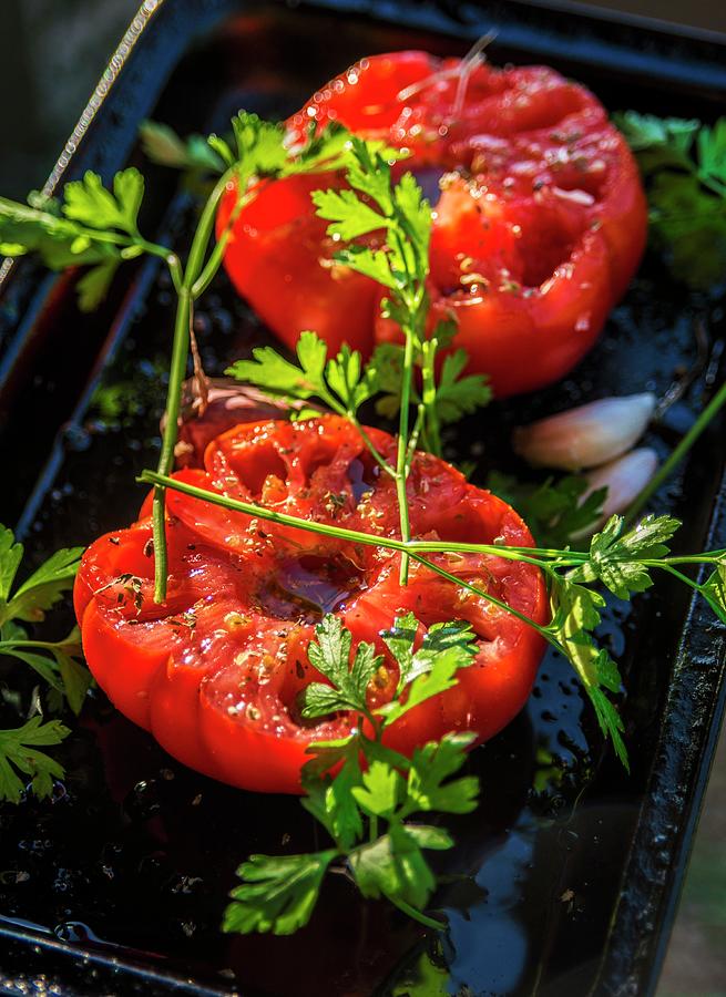 Roasted Tomato Halves With Garlic And Herbs, Fresh From The Oven Photograph by Roger Stowell