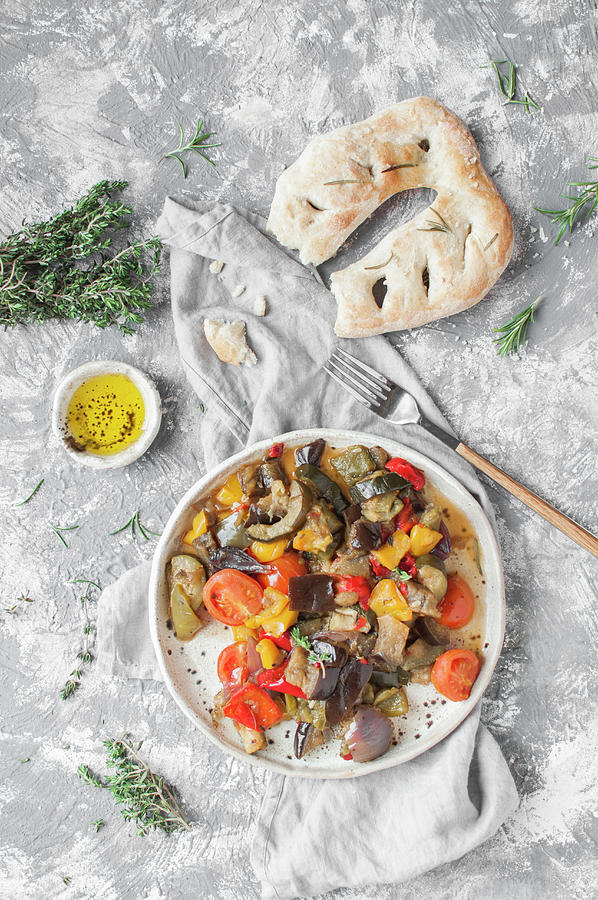 Roasted Veggies eggplant, Courgette, Bell Pepper, Onion And Tomatoes Served With Traditional Fougasse Photograph by Kachel Katarzyna