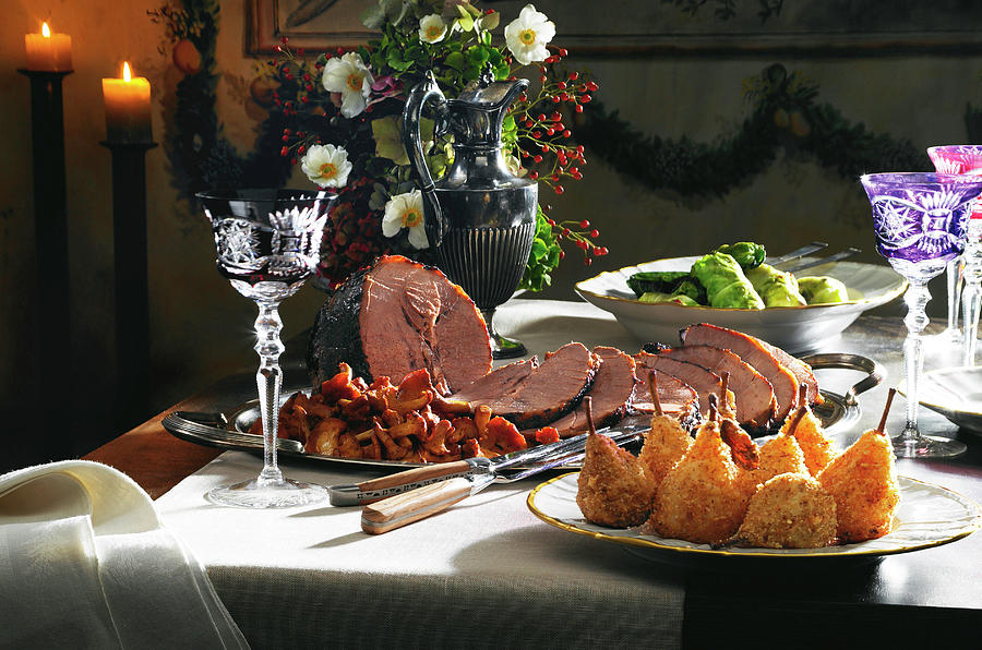 Roasted Wild Boar With Pears And Stuffed Cabbage On Dining Table ...