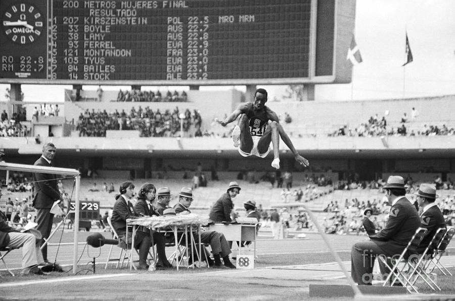 Robert Beamon Jumping To Break Record Photograph by Bettmann