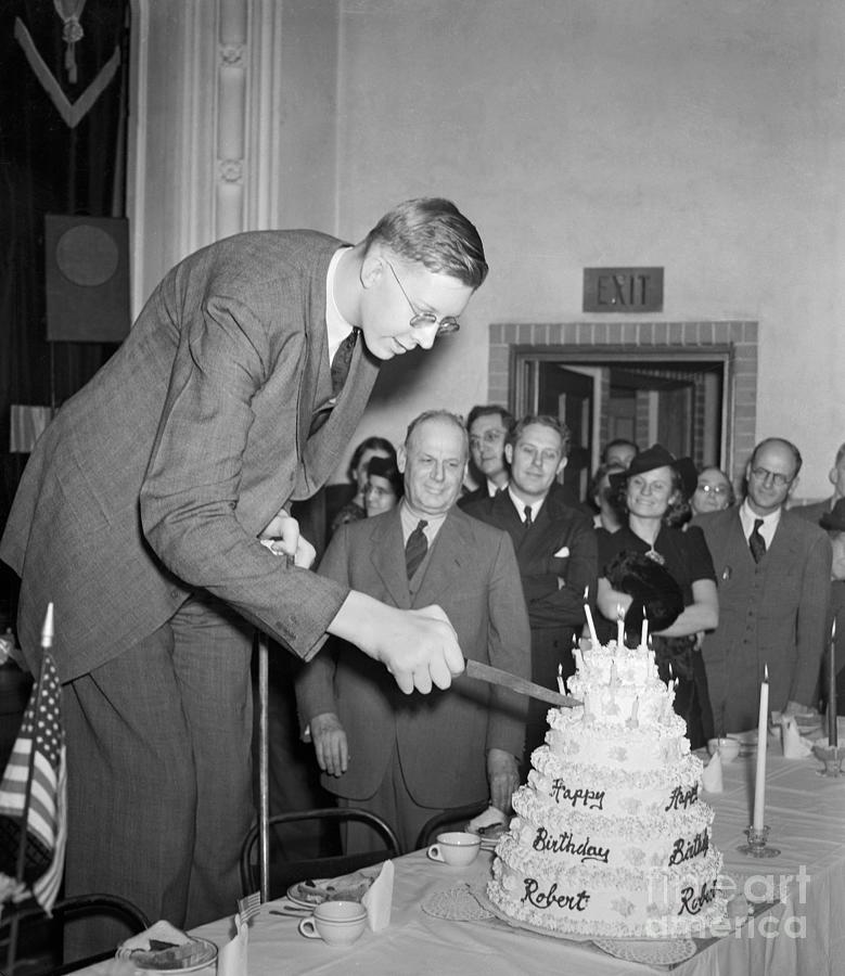 Robert Wadlow Cutting Birthday Cake Photograph by Bettmann
