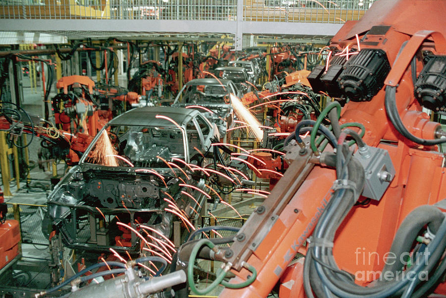 Robot Assembly At Ford Motor Plant Photograph by Bettmann