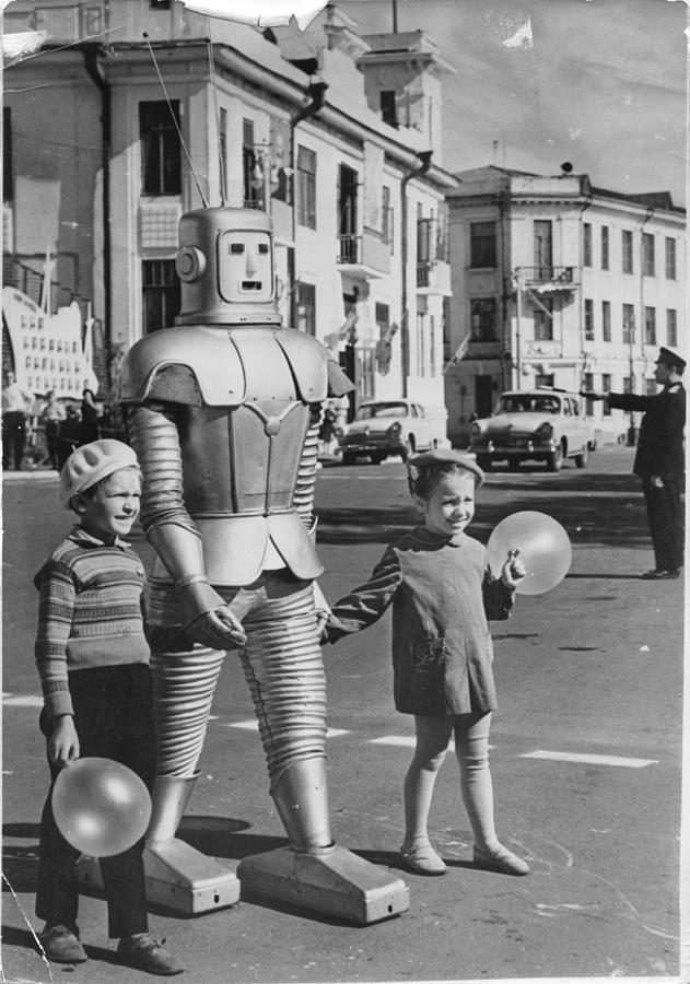 Robot Helping Children Cross Street Photograph by Keystone-france