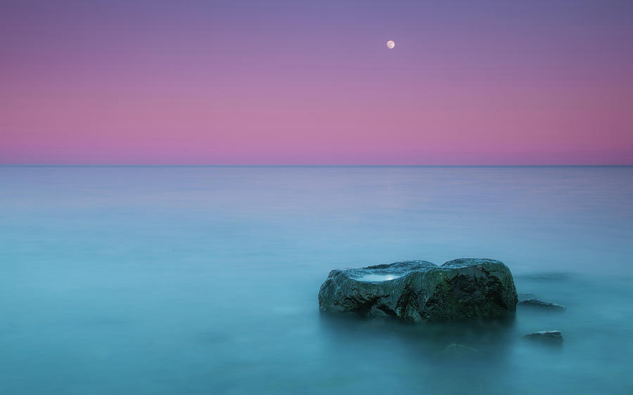 Rock At Coast With Rising Moon Photograph by Matthias Kirsch / Matkirsch.de