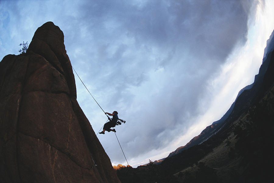 Rock Climber Hanging From Rope Wide Photograph by Chase Jarvis