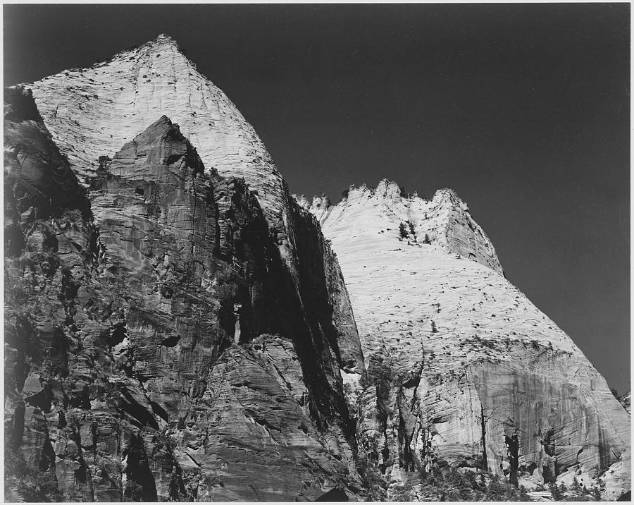 Rock formation against dark sky Zion National Park 1941 Utah. 1941 Painting by Ansel Adams